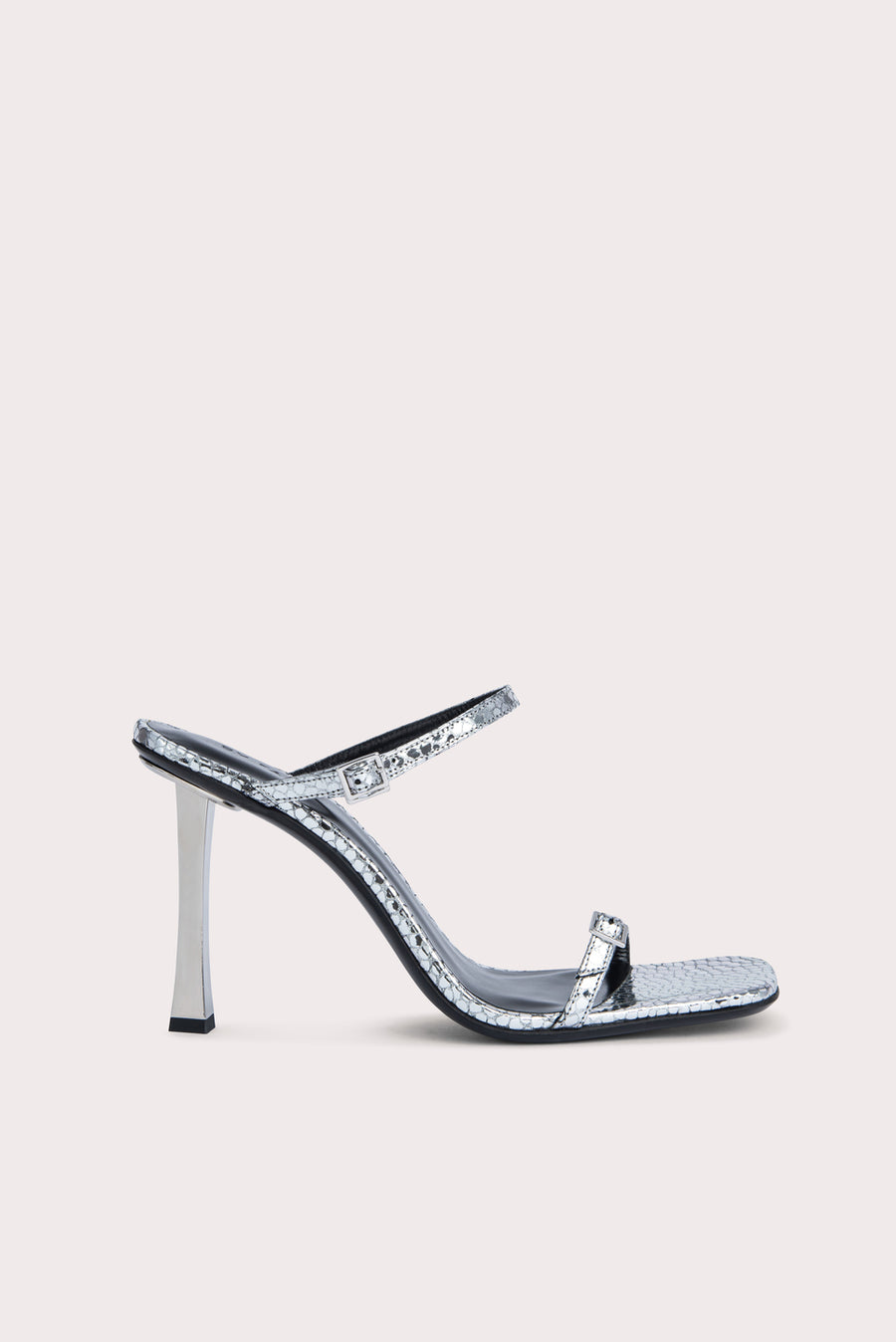 Slip these on and your outfit is instantly elevated. The 'Flick' heel is crafted from a silver flagstone leather and has mini buckles that can be adjusted. Pair with a frayed straight leg denim and a bustier to complete the look.