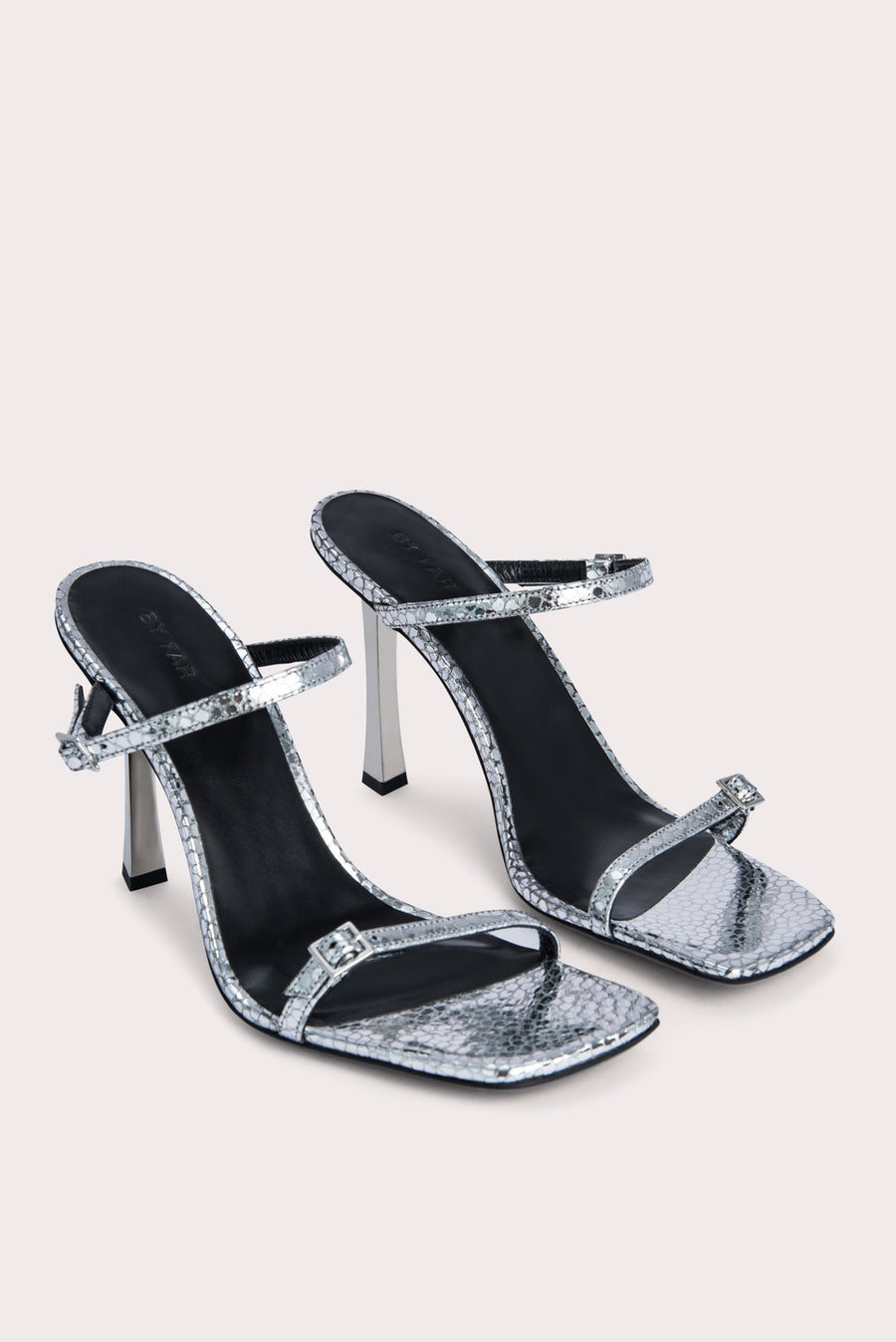 Slip these on and your outfit is instantly elevated. The 'Flick' heel is crafted from a silver flagstone leather and has mini buckles that can be adjusted. Pair with a frayed straight leg denim and a bustier to complete the look.