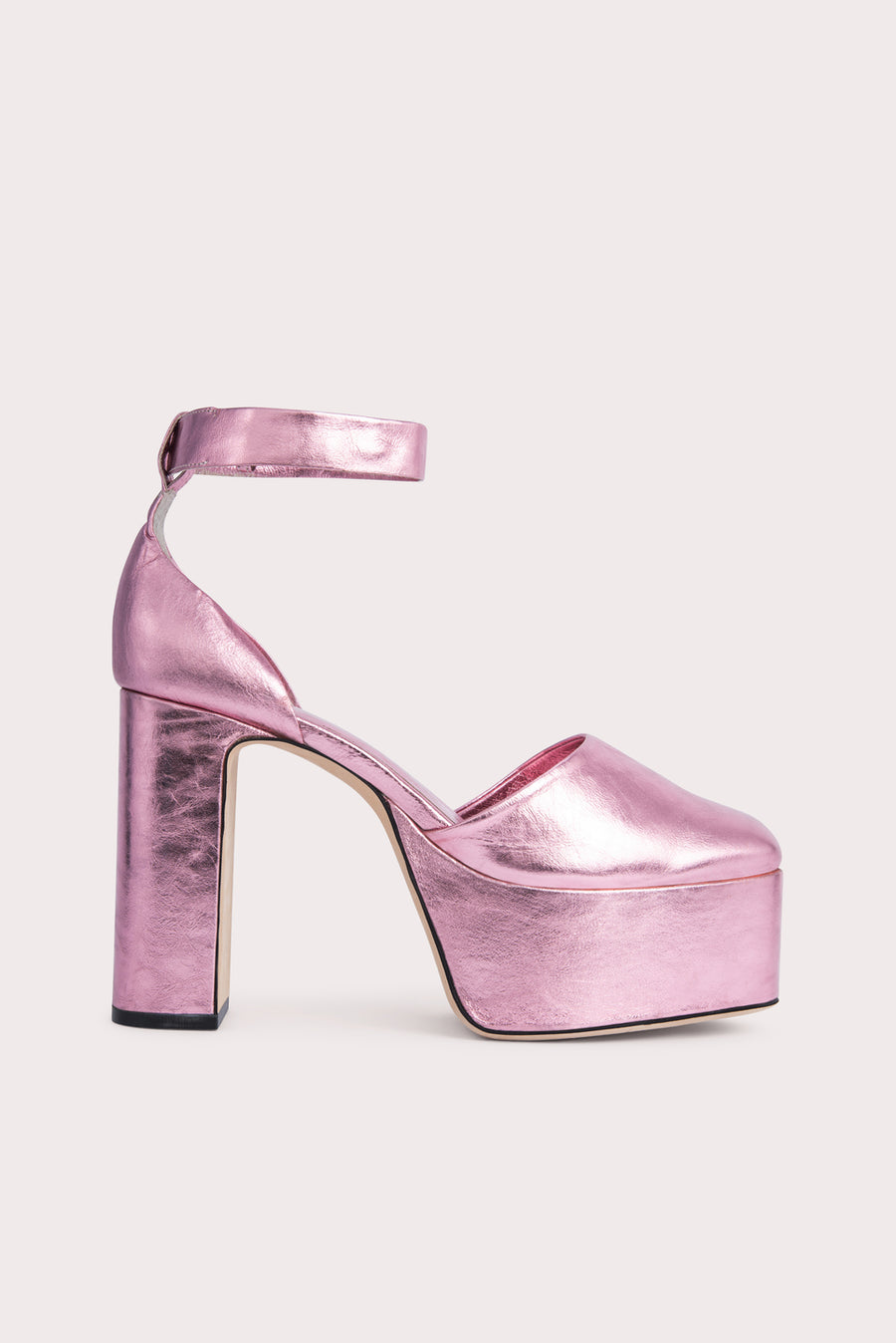 The 'Barb' platform pump. Standing tall on a 12cm block heel in metallic leather. Rounded toe, adjustable ankle strap. 