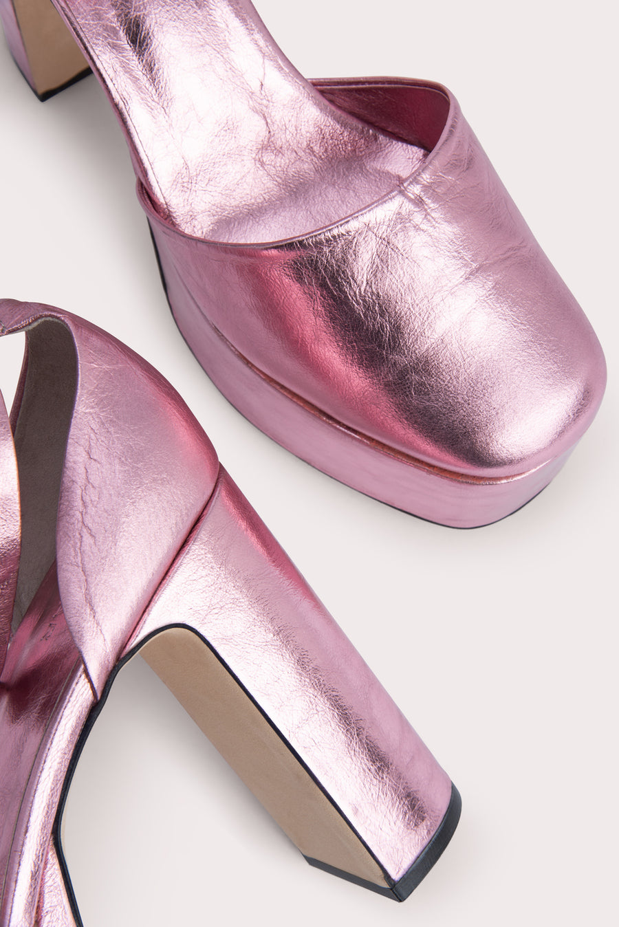 The 'Barb' platform pump. Standing tall on a 12cm block heel in metallic leather. Rounded toe, adjustable ankle strap. 