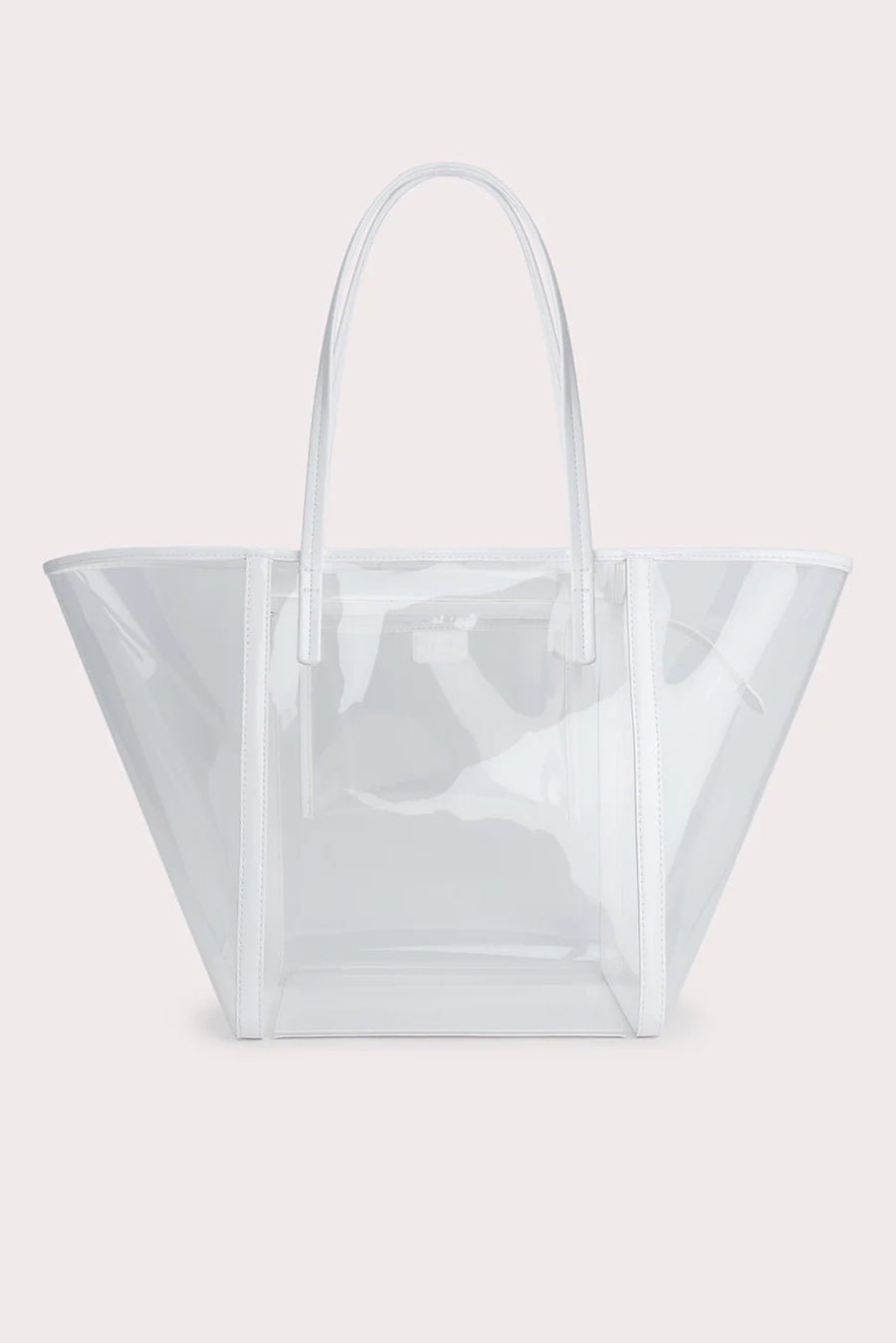 The Club Tote. Inside zip pocket. Made from transparent PU. Slim handles and zip closure.