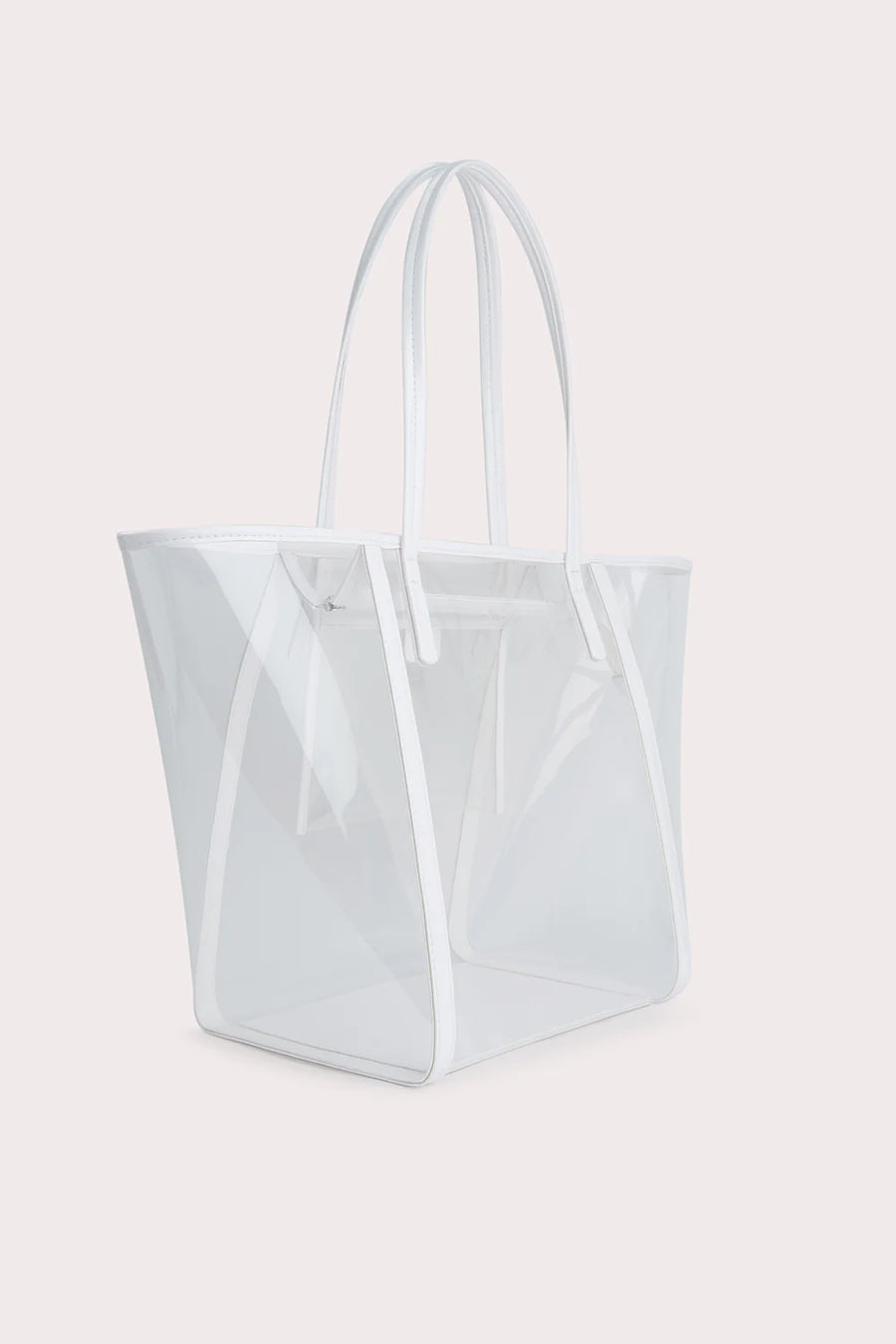 The Club Tote. Inside zip pocket. Made from transparent PU. Slim handles and zip closure.