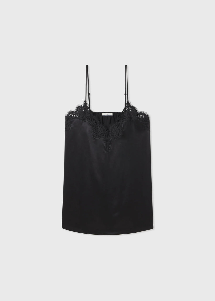 A v-neck bias cut silk camisole with lace trim at neckline and adjustable straps.