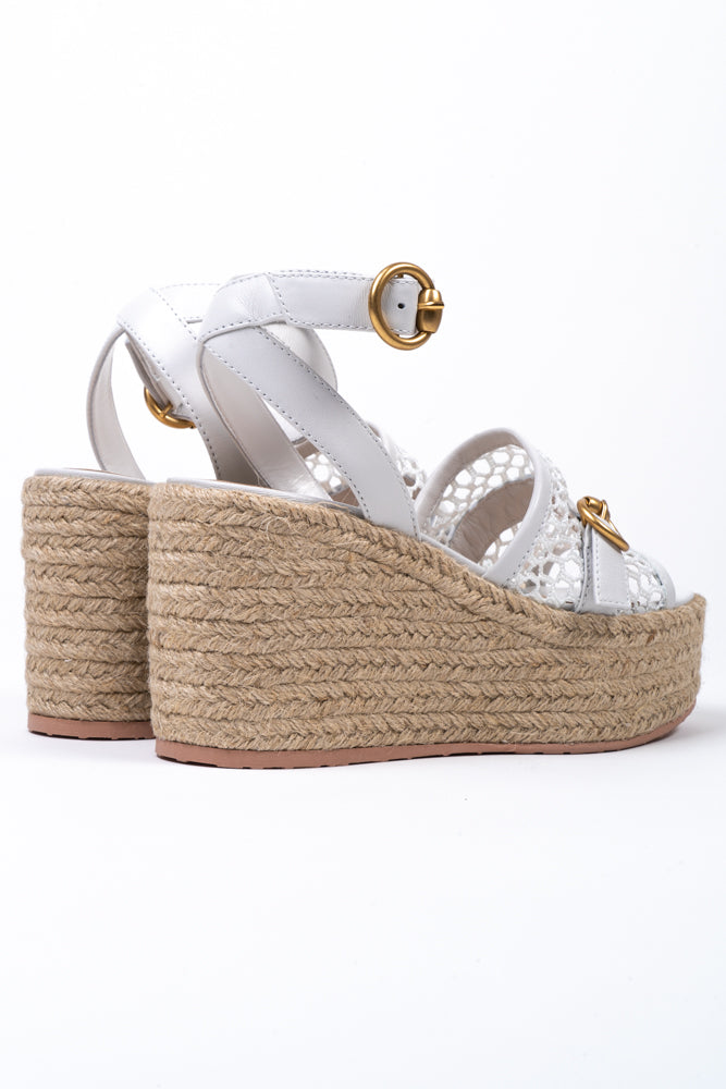 Giving you height and comfort - the raffia wedge returns, here complete with signature fishnet fabric, and gold hardware detailing. Featuring an adjustable ankle strap for extra support.