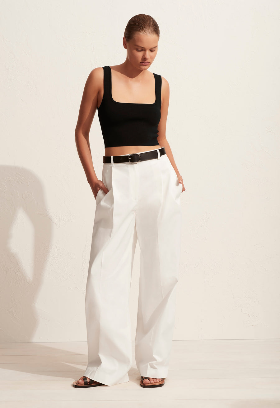 The 'Nineties Crop Top' is a square neck knitted cropped tank with slim straps. Its vintage vibe and simple silhouette make this top an easy wardrobe essential.