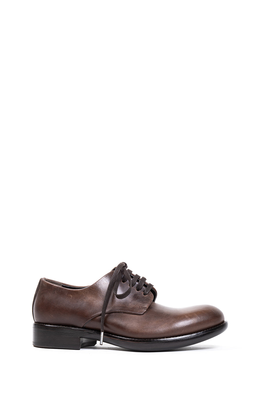 A classic brogue in Rocco's iconic last. Featuring a rounded toe, in a luxe chocolate-hued leather, and a stacked black leather sole.