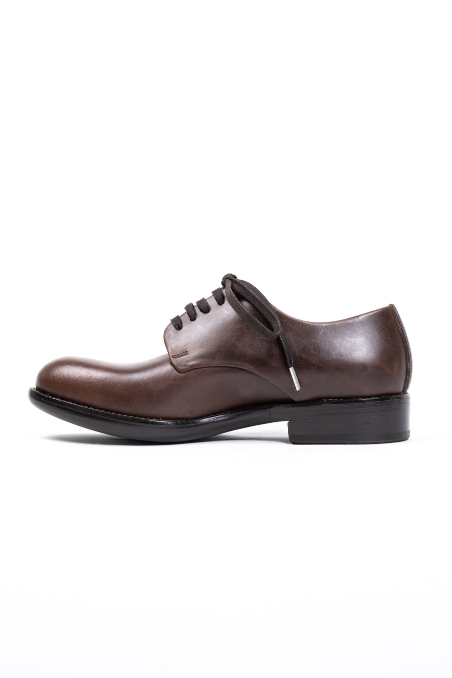 A classic brogue in Rocco's iconic last. Featuring a rounded toe, in a luxe chocolate-hued leather, and a stacked black leather sole.