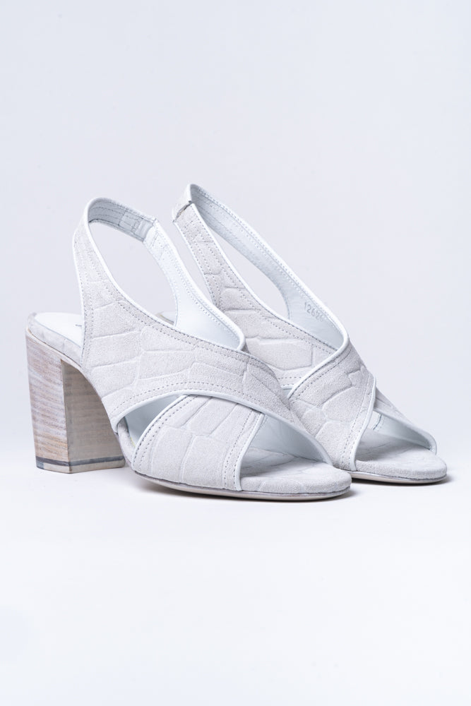 A best-selling shape from Rocco, the criss-cross sandal returns. Featured here in a stunning stone grey, stamped suede and tonal leather heel, and sole. 